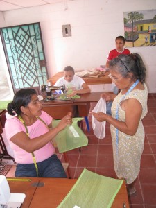 Women in El Salvador assembling Erin's FAVE bags.