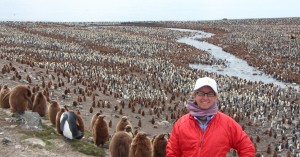 Kimball at St. Andrews Bay in the South Georgia Islands. And behind her, a colony of about 200,000 pairs of King penguins!