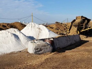 Pile of gypsum next to compost heap