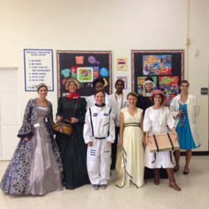 Group of volunteers dressed up as historical science characters