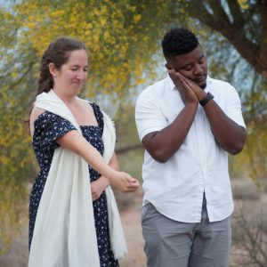 Two ASU students act out a scene for "Positively Ghostly" performance