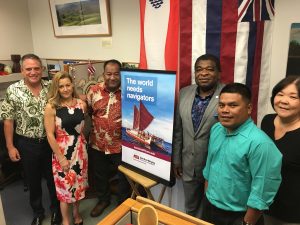 Amanda Ellis with Hawaii Senate leaders and others next to "The World Needs Navigators" ASU sign