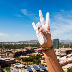 ASU forks up A mountain hand with white paint