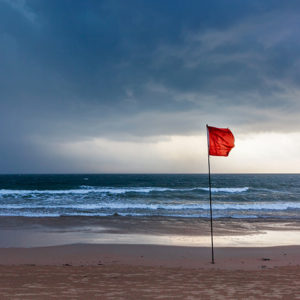 Red flag on beach as hurricane approaches
