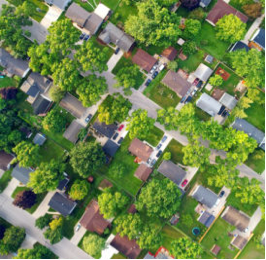 view of neighborhood from above, with lots of trees