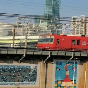 Orange Train in Japanese City