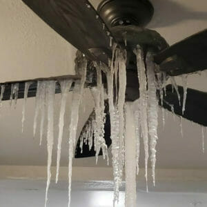 Ceiling fan covered with ice from storm in Texas