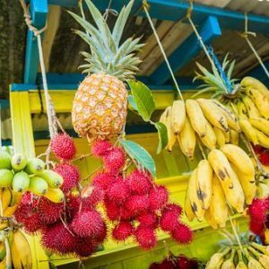 Image of Hawaiian fruit including pineapple, bananas and others.