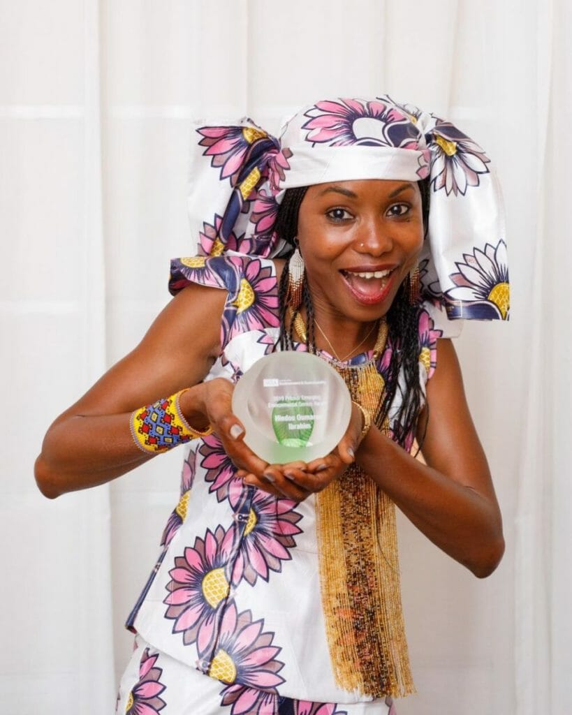 Hindou Oumarou Ibrahim posing with her 2019 Pritzker Emerging Environmental Genius Award