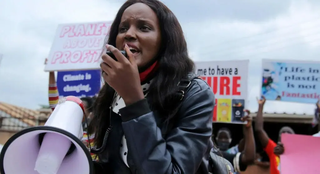 Vanessa Nakate at event speaking to the crowd over a megaphone