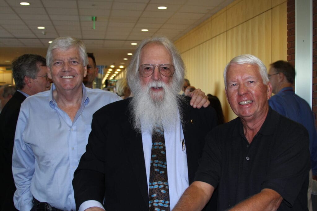 photo of George Poste, Roy Curtiss and Charles Arntzen at an event.